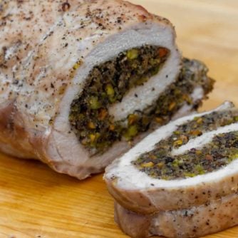 A butterflied boneless pork loin stuffed with duxelles type stuffing with sauteed mushrooms, shallots, pistachios, parmesan cheese and fresh oregano. How to instructions to butterfly a pork loin.
