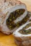 A butterflied boneless pork loin stuffed with duxelles type stuffing with sauteed mushrooms, shallots, pistachios, parmesan cheese and fresh oregano. How to instructions to butterfly a pork loin.