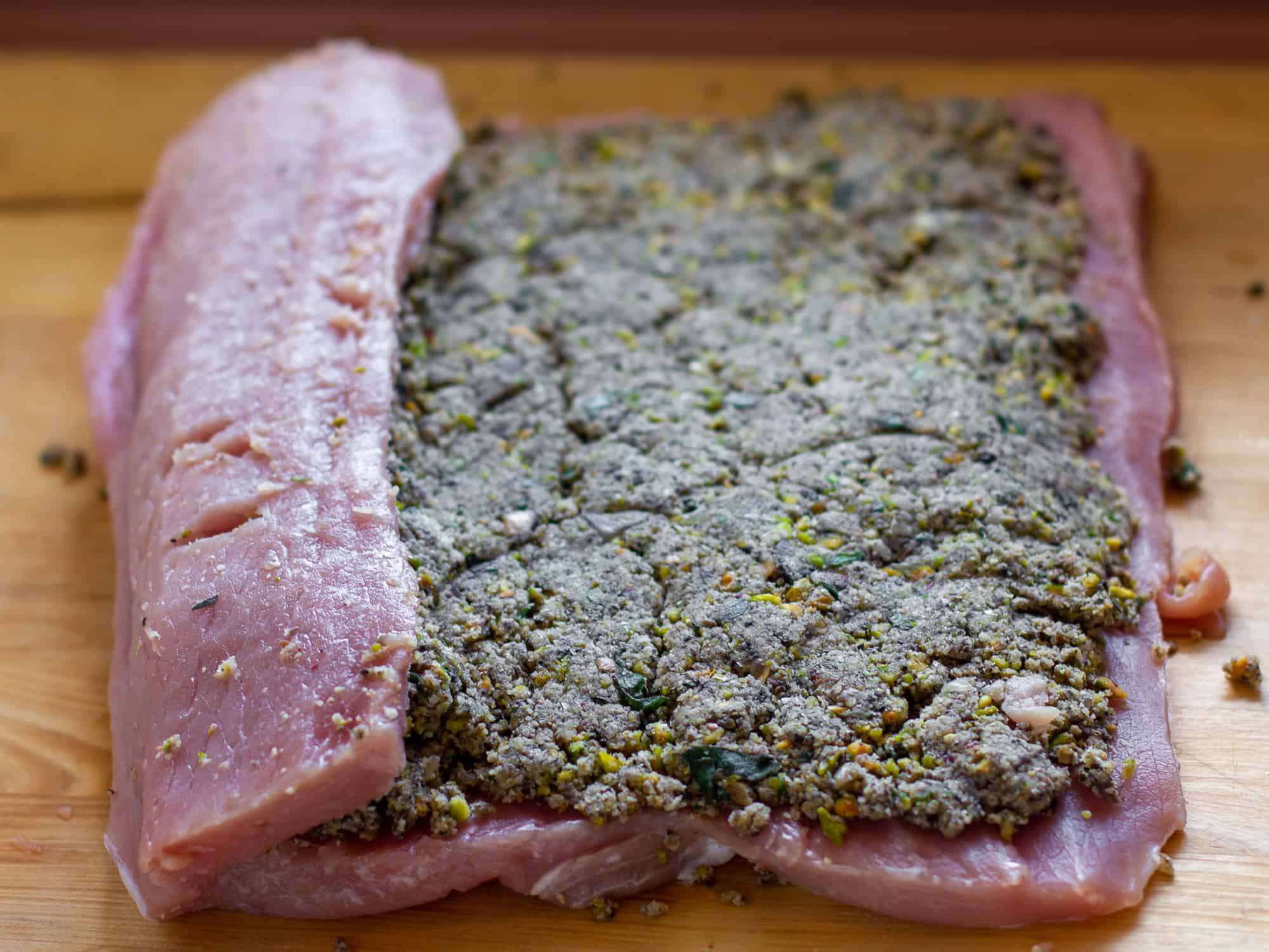 Carefully roll up the pork loin.