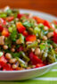 A bowl of Mexican inspired salad with prickly pear cactus and black eyed peas