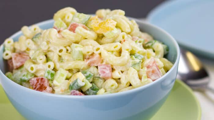 A bowl of pasta salad.