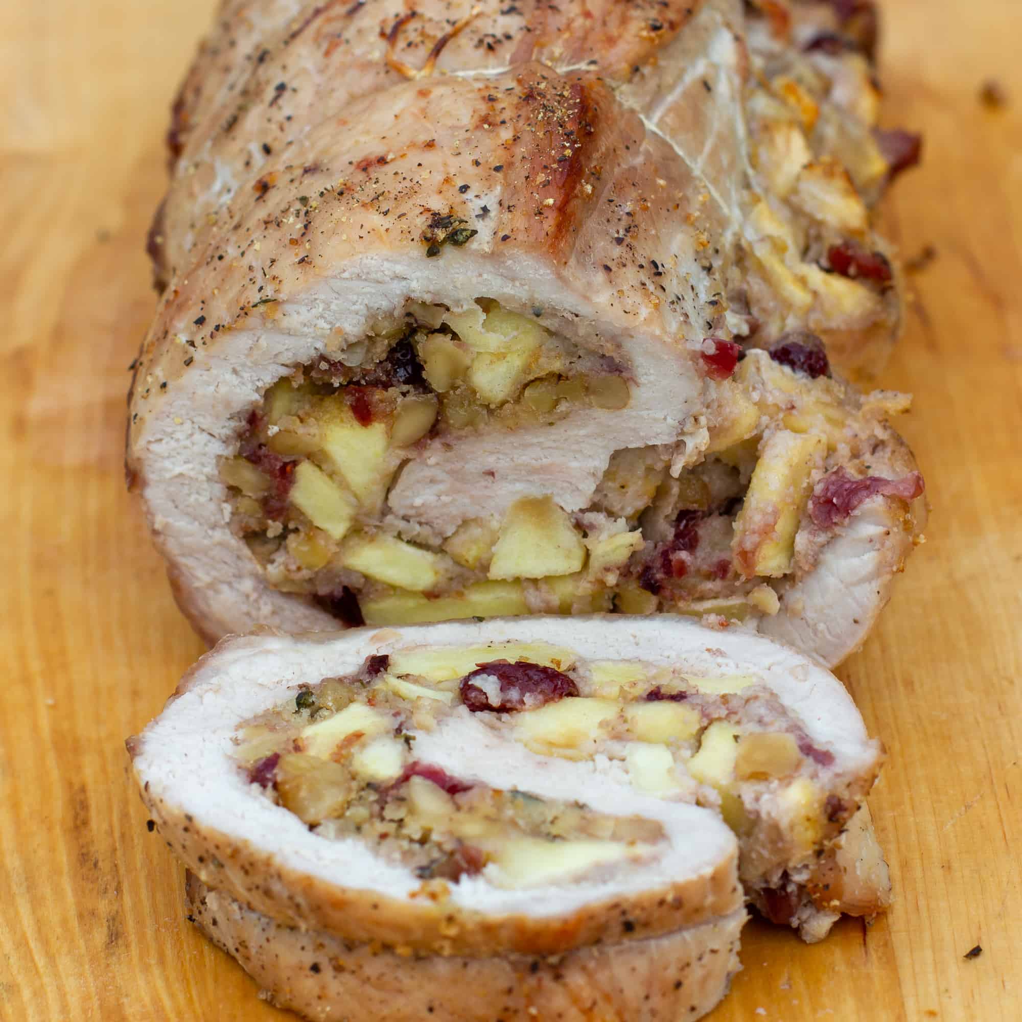 A butterflied boneless pork loin stuffed with apples, cranberries, walnuts and fresh thyme. How to instructions to butterfly a pork loin.