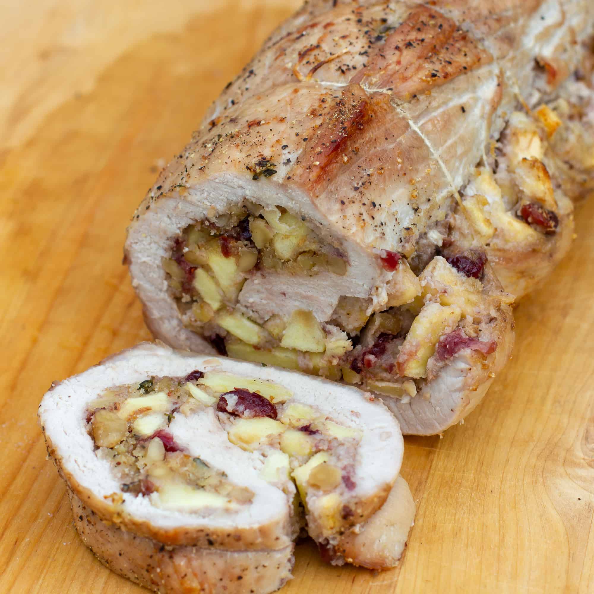 A butterflied boneless pork loin stuffed with apples, cranberries, walnuts and fresh thyme. How to instructions to butterfly a pork loin.