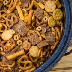 Make Bits and Bites mix at home with this simple recipe. Shreddies, Cheerios, Cheese Bits, Ritz, Pretzels, Chex and mixed with butter, worchestershire sauce, tabasco and spices