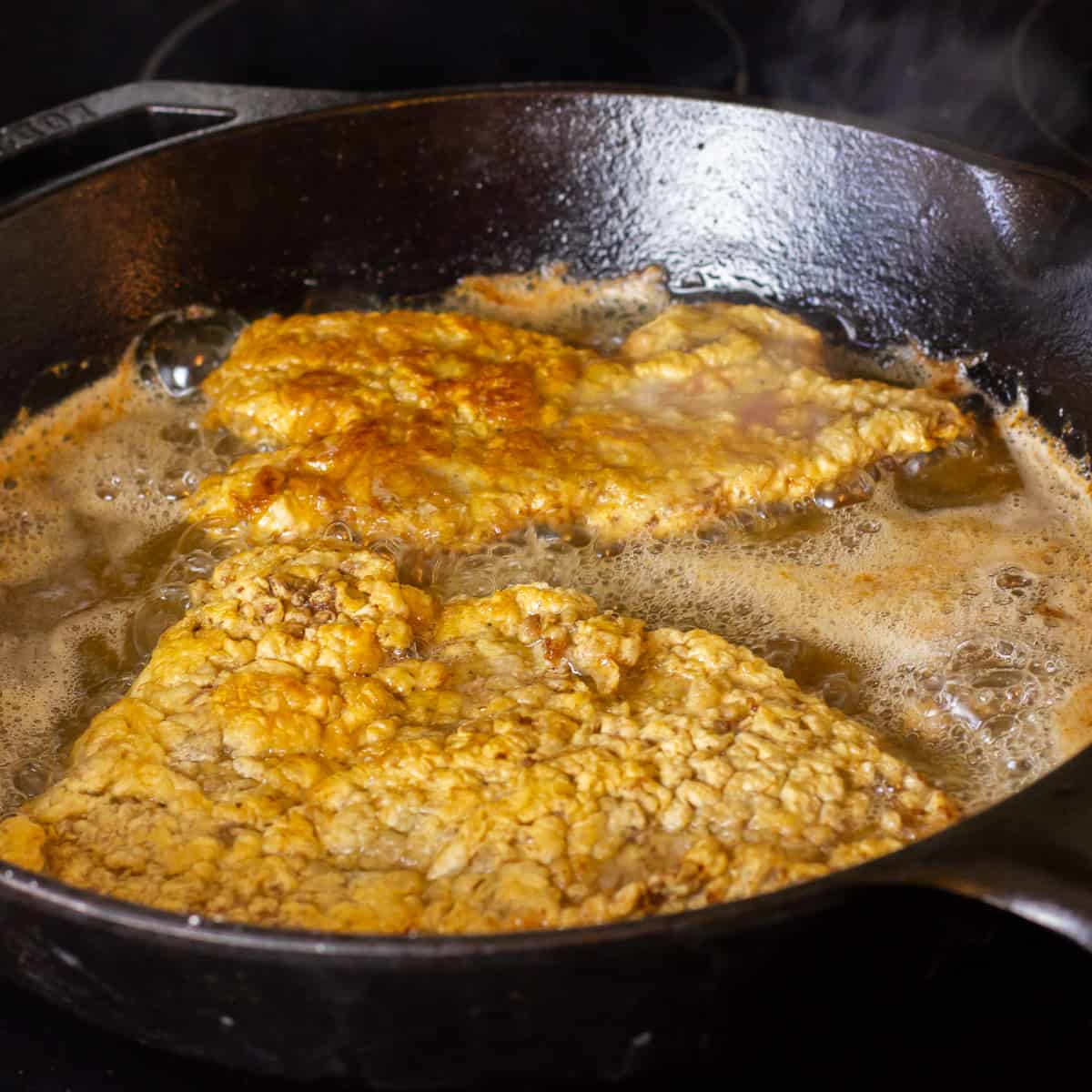 Fry in a cast iron skillet with oil until golden brown.