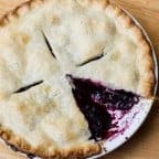 Traditional country pie pastry made with lard and a filling made of fresh blueberries, sugar, tapioca and lemon juice. Flaky, tender and delicious. Easy instructions for how to make this homemade pie.