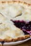 Traditional country pie pastry made with lard and a filling made of fresh blueberries, sugar, tapioca and lemon juice. Flaky, tender and delicious. Easy instructions for how to make this homemade pie.