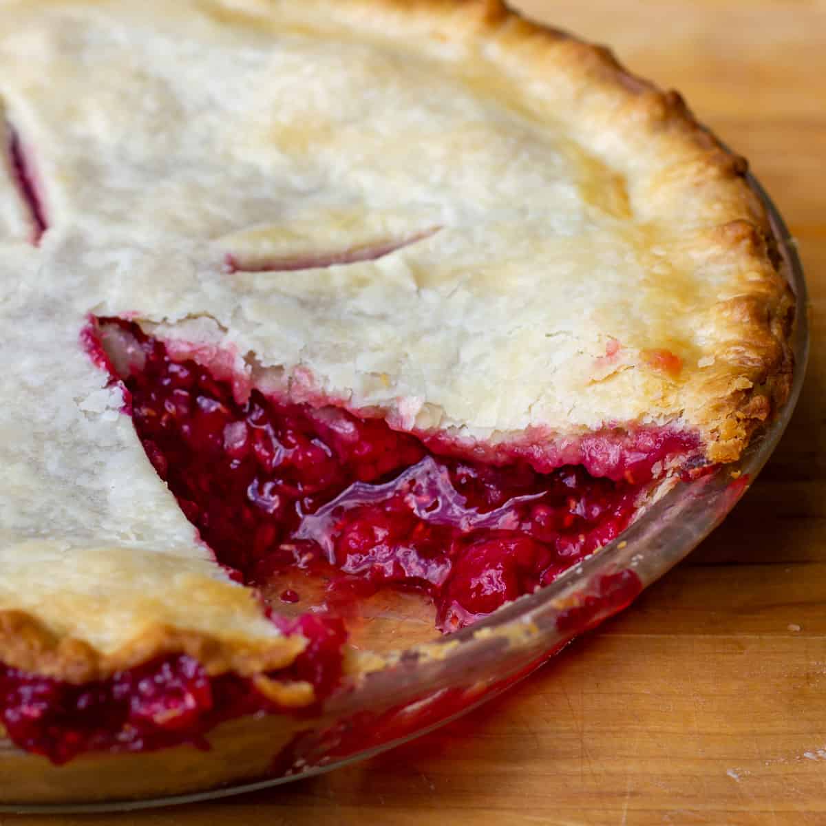 A close up of a sliced pie.