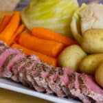 This classic Irish dish boils corned beef brisket, potatoes, carrots and more. Smoked pork shoulder, turnips, cabbage, or onions can also be added.