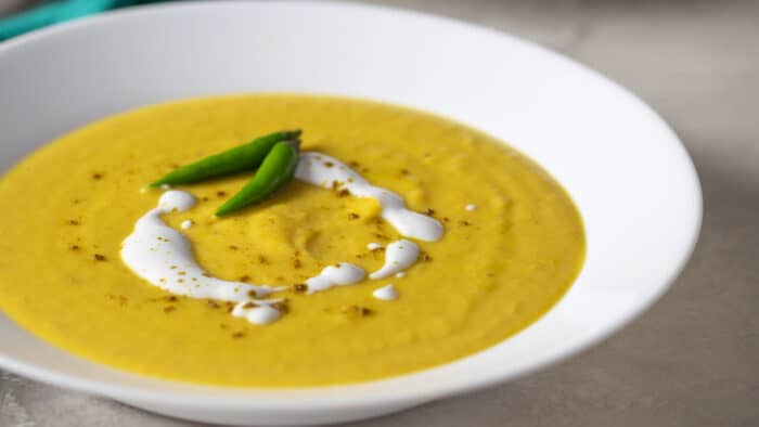 A closeup picture of a bowl of soup.