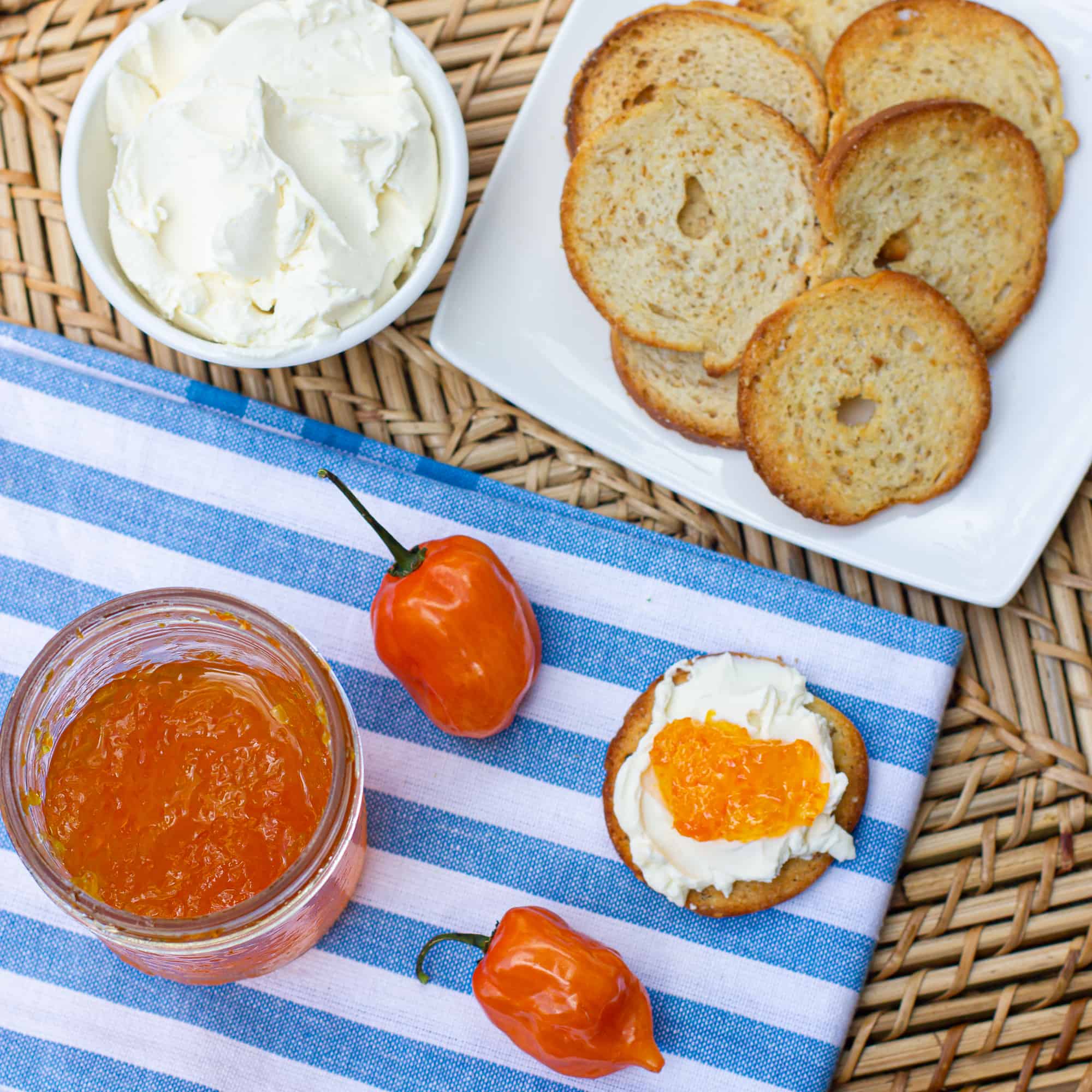 Easy to make sweet red pepper jelly that is great with crackers and cream cheese. Simple canning with instructions for how to process in hot water bath.