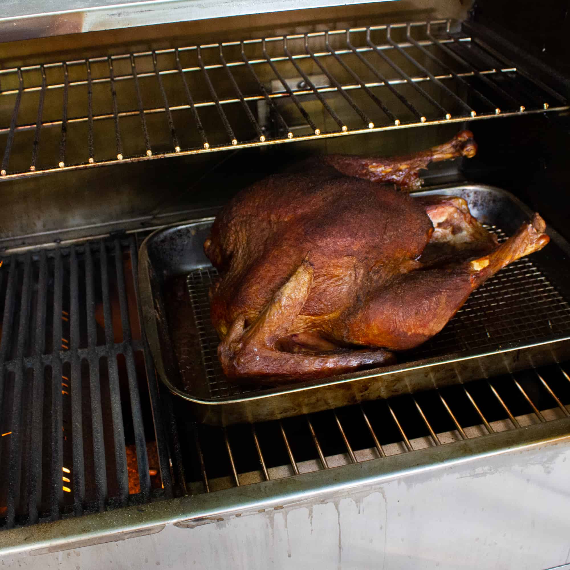 Grilling a turkey is an excellent way to cook the thanksgiving bird. Great recipe for wood, charcoal and gas grills to cook using indirect grilling.