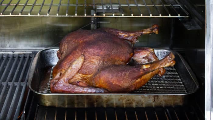 Grilling a turkey is an excellent way to cook the thanksgiving bird. Great recipe for wood, charcoal and gas grills to cook using indirect grilling.