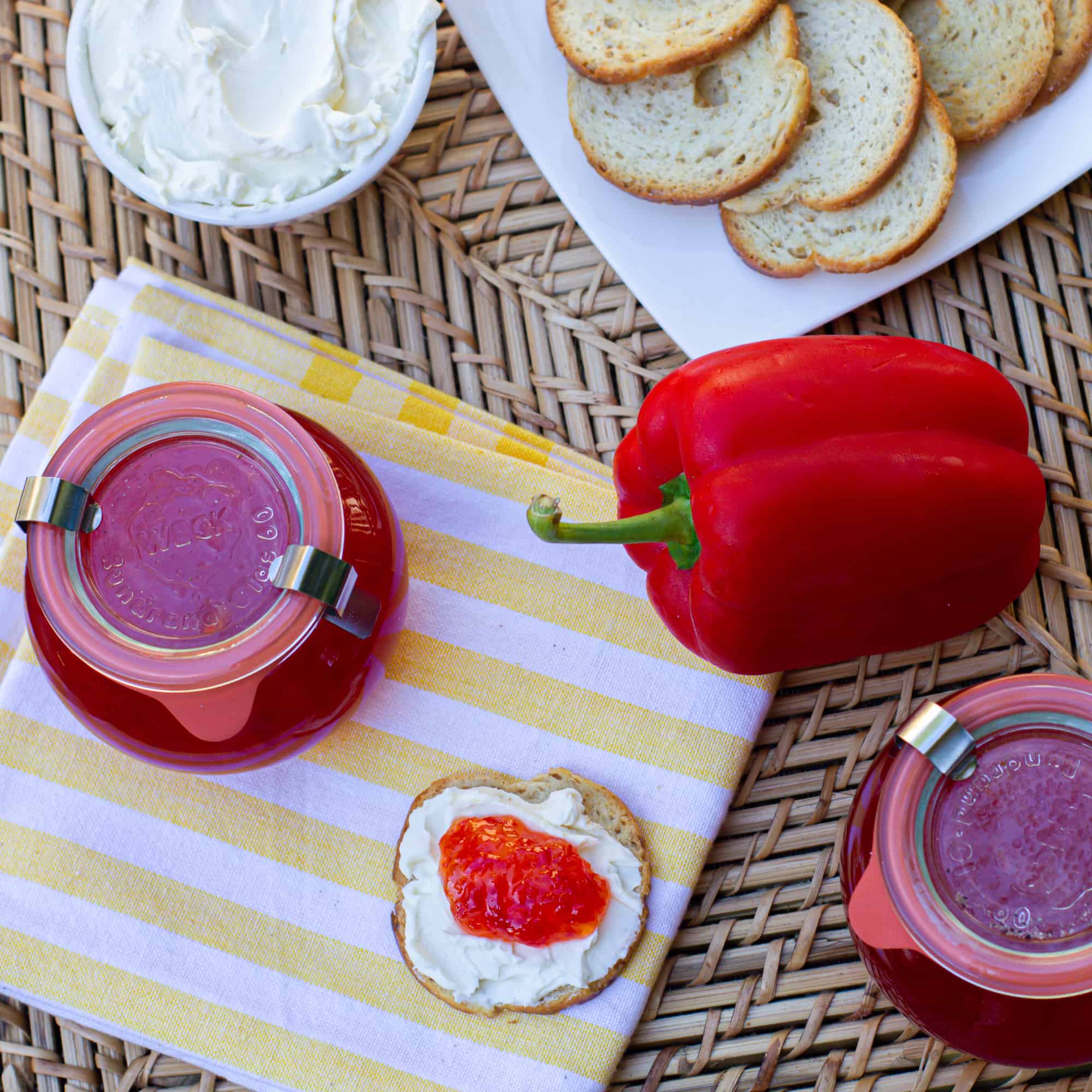 Easy to make sweet red pepper jelly that is great with crackers and cream cheese. Simple canning with instructions for how to process in hot water bath.