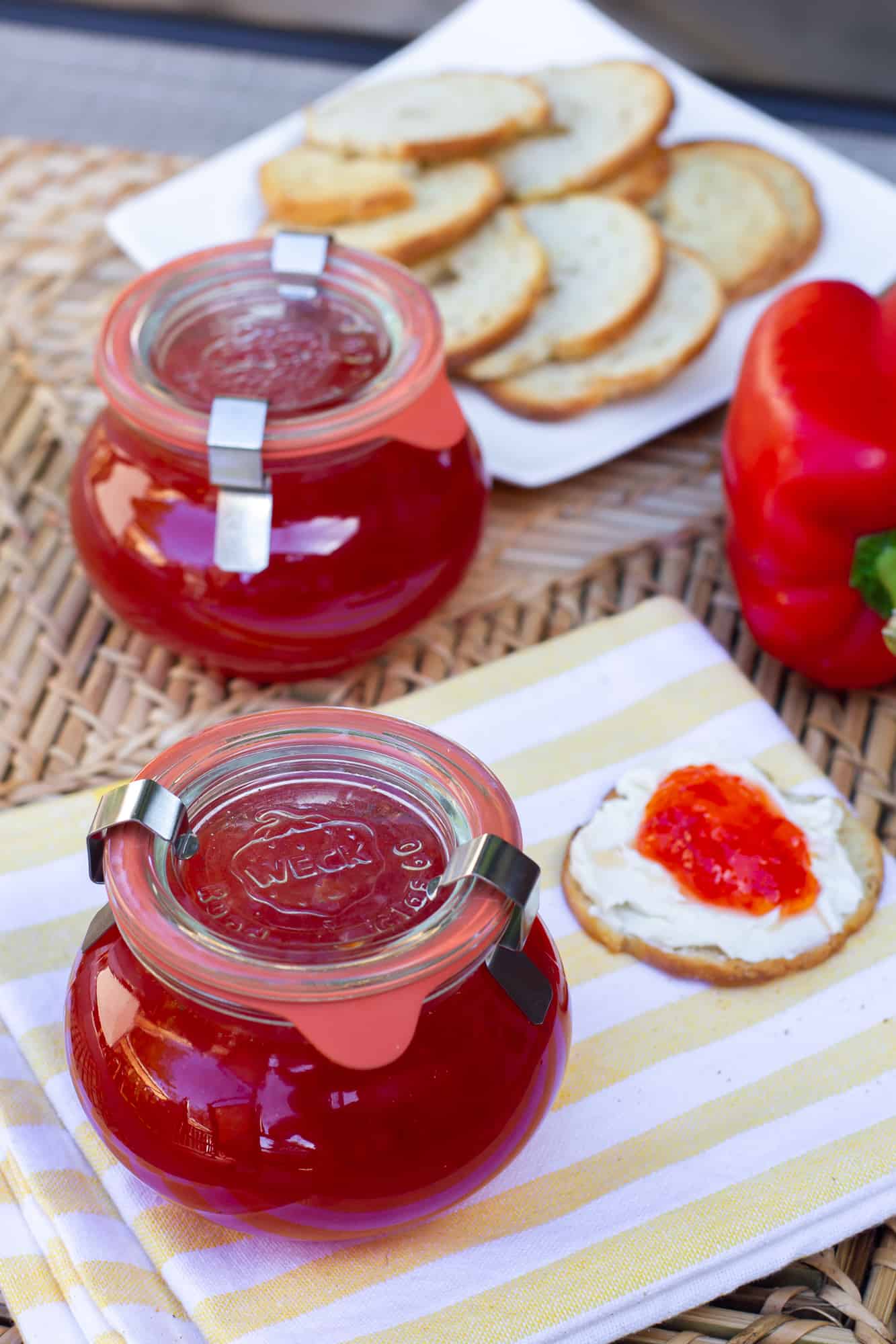 Easy to make sweet red pepper jelly that is great with crackers and cream cheese. Simple canning with instructions for how to process in hot water bath.