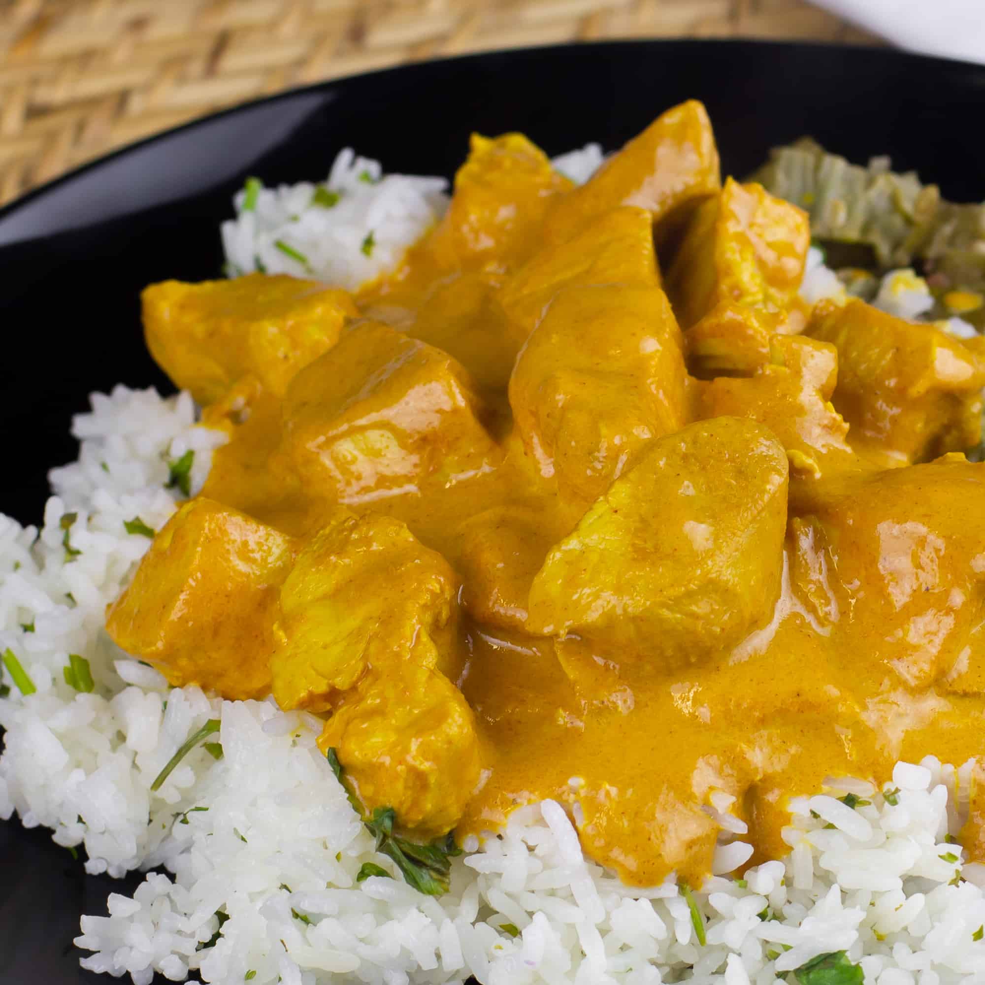 Crock Pot Chicken Tikka Masala recipe that is creamy and mild Indian curry (like butter chicken). Make in the slow cooker and serve on rice. 