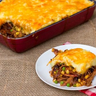 Use leftover pulled pork in this classic comfort food recipe. Mashed potatoes, corn, peas, cheese. Whether the pork is smoked or made in a slow cooker, this recipe works great.