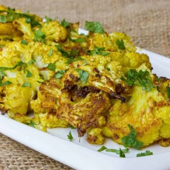 Roasting cauliflower brings out the sweet caramelized flavor of each floret. Toss with curry powder, garlic powder, turmeric and oil. Then squeeze lemon juice and sea salt.