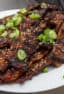 Kalbi, thin sliced short ribs in a Korean marinade. Once grilled, these ribs are packed with so much flavor and they basically melt in your mouth.
