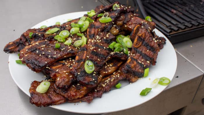 Kalbi, thin sliced short ribs in a Korean marinade. Once grilled, these ribs are packed with so much flavor and they basically melt in your mouth.