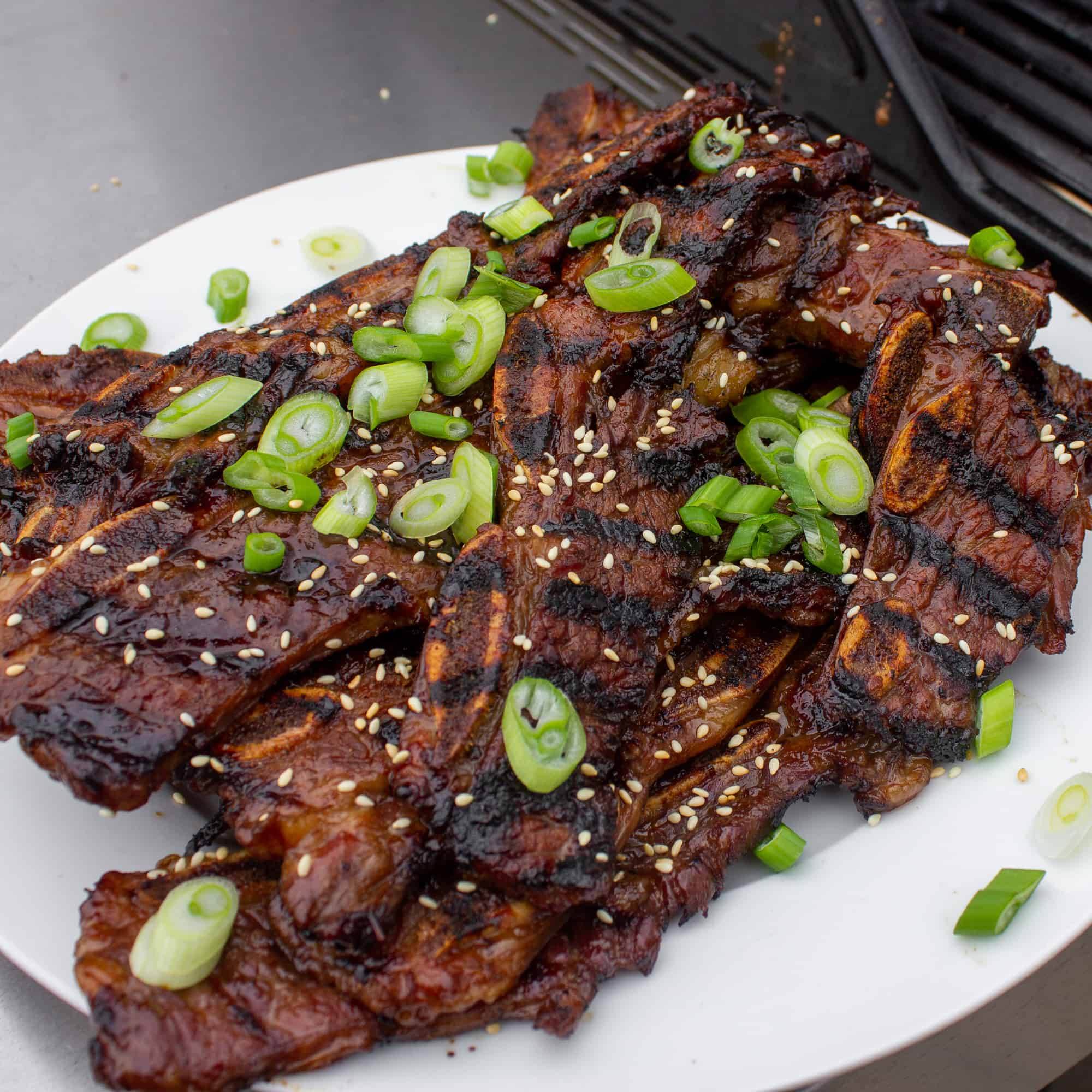 Kalbi, thin sliced short ribs in a Korean marinade. Once grilled, these ribs are packed with so much flavor and they basically melt in your mouth.