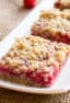 These dessert squares with raspberries and oat crumble are sweet, tangy and totally delicious. Raspberries, oats, brown sugar, butter, flour and more