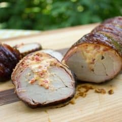 Bacon Wrapped Smoked Pork Tenderloin Stuffed with Roasted Red Peppers and Cheese