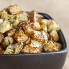 A bowl of oven roasted hash brown potatoes.