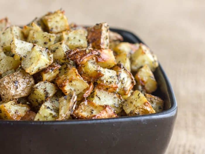 A bowl of oven roasted hash brown potatoes.