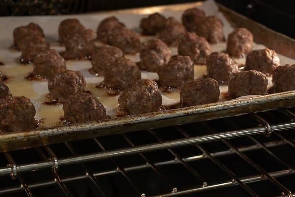 Cooking meatballs has never been easier than baking them in the oven. A simple recipe for meatballs that can be used in spaghetti sauce, with honey garlic sauce, for swedish meatballs and more!