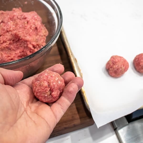Cooking meatballs has never been easier than baking them in the oven. A simple recipe for meatballs that can be used in spaghetti sauce, with honey garlic sauce, for swedish meatballs and more!