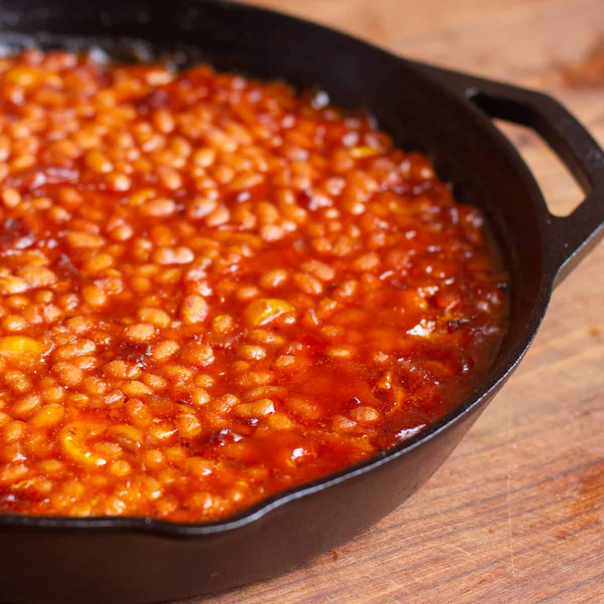 Closeup picture of cast iron skillet beans