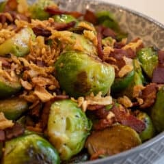 A bowl of cooked Brussel's sprouts with bacon