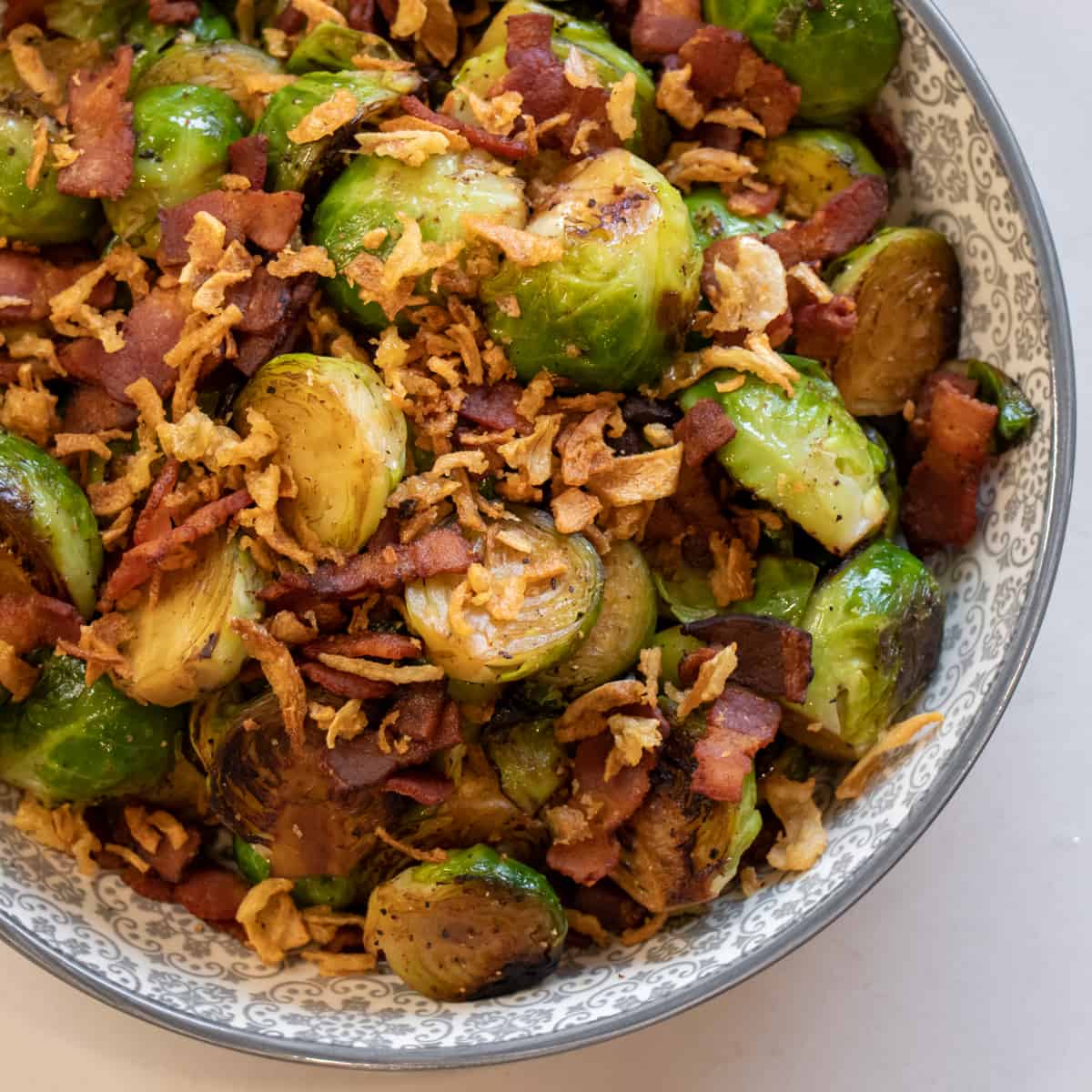 Overhead picture of Brussel's Sprouts, bacon and fried onions.