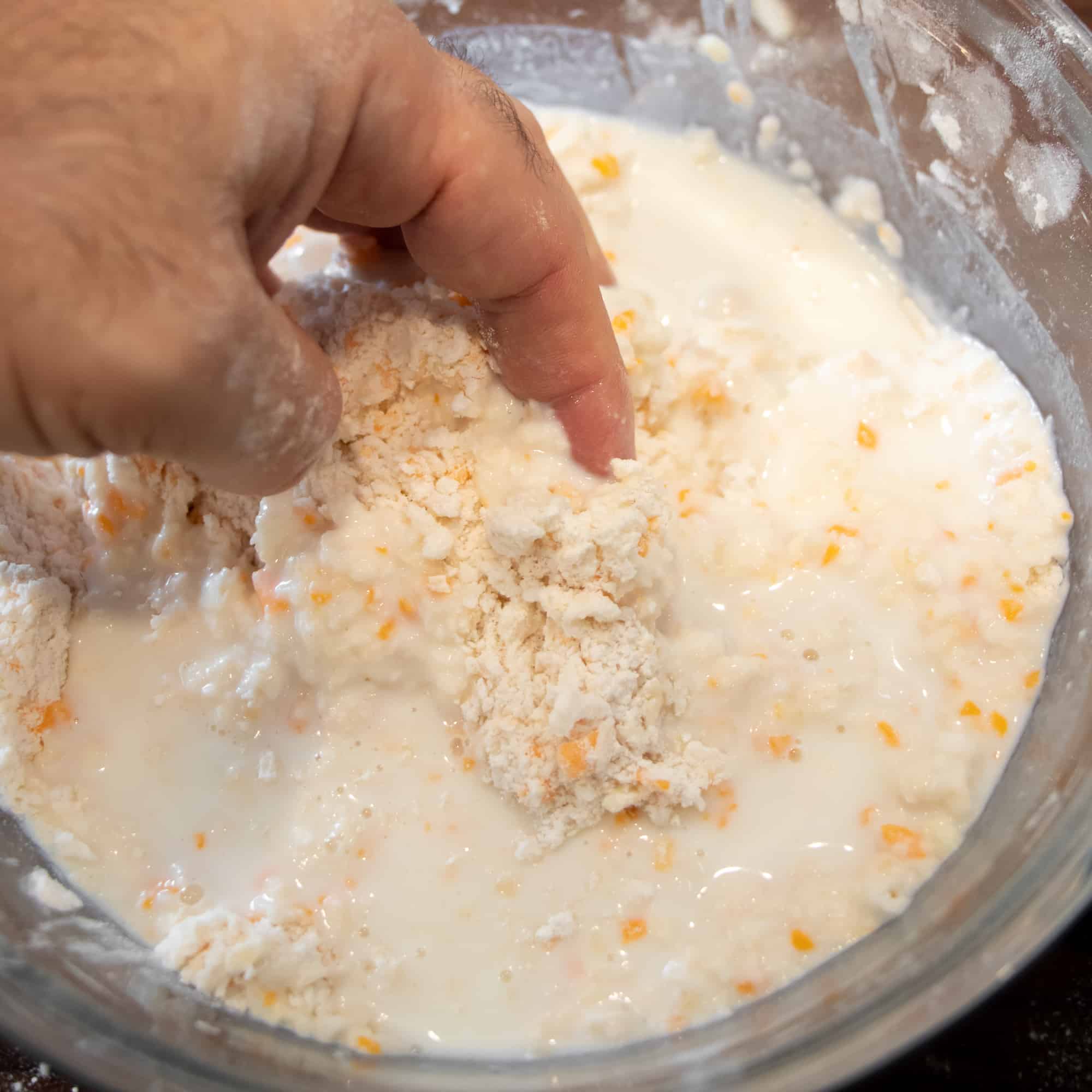 Mixing the milk in by hand