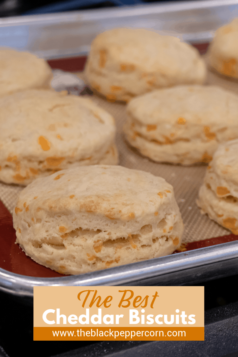 Simple recipe for how to bake cheddar cheese biscuits that are buttery, flakey and simple to make in the oven. Fresh baked and similar to Red Lobster's Cheddar Bay biscuits.