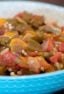 Simple recipe for how to make stewed okra southern side dish. Creole and cajun style with tomatoes, onions and peppers.