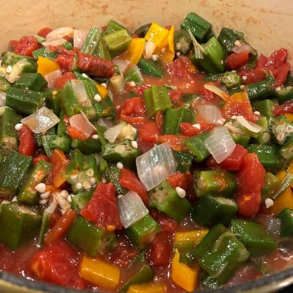 Classic stewed okra and tomatoes with onions, peppers, celery and creole seasoning. A great side dish recipe for any southern or Cajun meal!