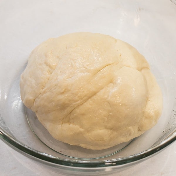 Simple to make rustic artisan bread recipe that can be baked in a clay bread cloche, dutch oven, or baking sheet.