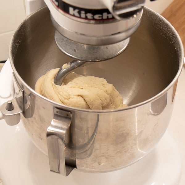 Simple to make rustic artisan bread recipe that can be baked in a clay bread cloche, dutch oven, or baking sheet.