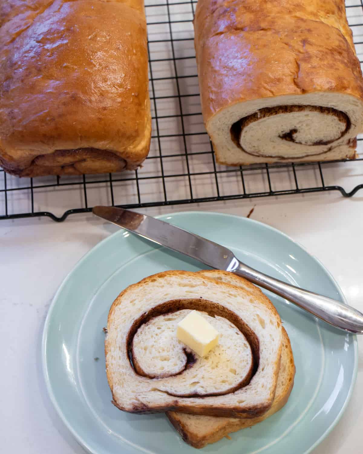 Cinnamon bread slices on a plate.