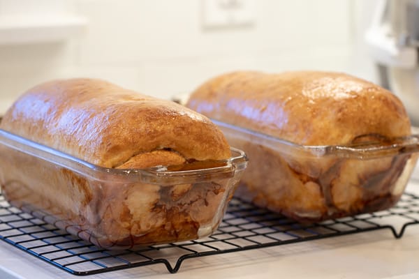 Easy instructions for how to bake cinnamon swirl bread. This recipe makes 2 loaves of fresh sweet cinnamon bread that is great with butter, toasted or used as french toast! Just like a bakery made right at home!