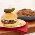 How to make pulled pork in a pressure cooker like an Instant Pot. Simple recipe that uses a pork roast, like a shoulder, blade or picnic, can of pop, BBQ sauce, onion, peppers, celery and mushrooms for a pulled pork full of flavour!