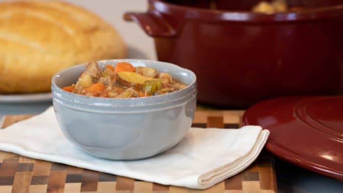 Delicious recipe and instructions for how to make pork stew in a dutch oven with pork tenderloin, potatoes, carrots, onions, mushrooms, celery and more.