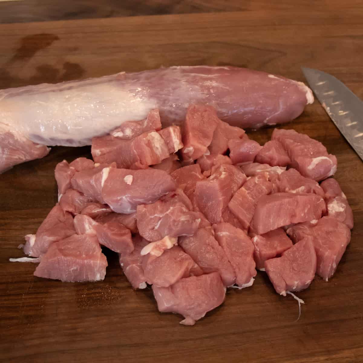 Pork tenderloin cut into cubes.