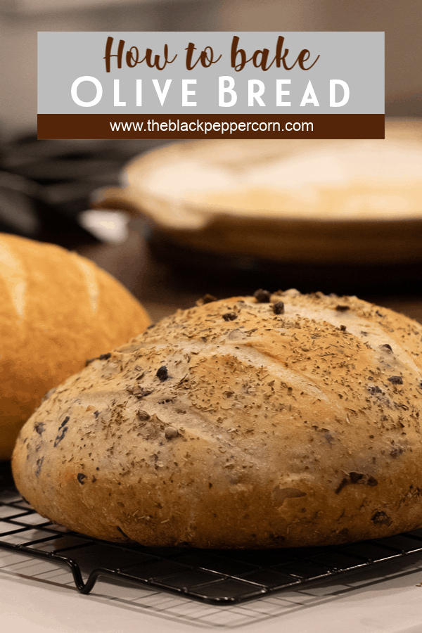 Easy to make rustic olive bread with oregano. Crusty round bread loaf with kalamata olives. How to bake recipe for a delicious fresh loaf of bread.