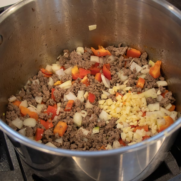 Easy to make recipe for soup full of Mexican inspired flavours. Ground beef, tomatoes, black beans, corn chili powder and more.
