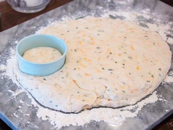 Simple recipe for how to bake cheddar cheese biscuits that are buttery, flakey and simple to make in the oven. Fresh baked and similar to Red Lobster's Cheddar Bay biscuits.