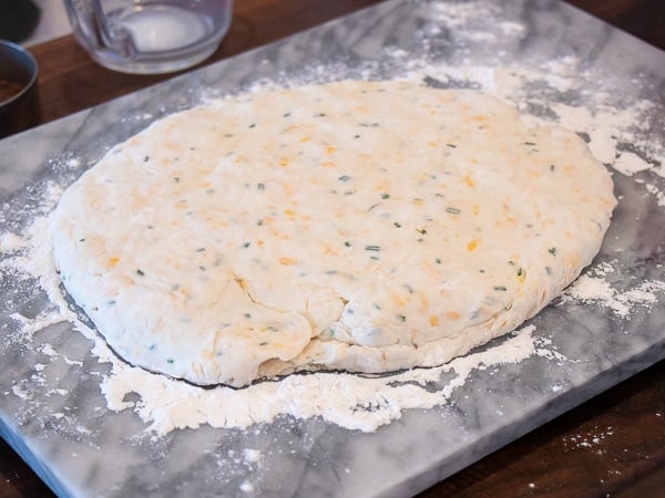 Simple recipe for how to bake cheddar cheese biscuits that are buttery, flakey and simple to make in the oven. Fresh baked and similar to Red Lobster's Cheddar Bay biscuits.