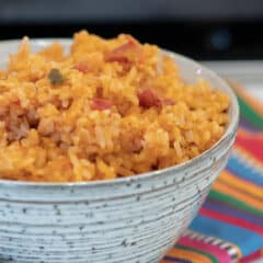 Close up picture of a bowl of Mexican rice.